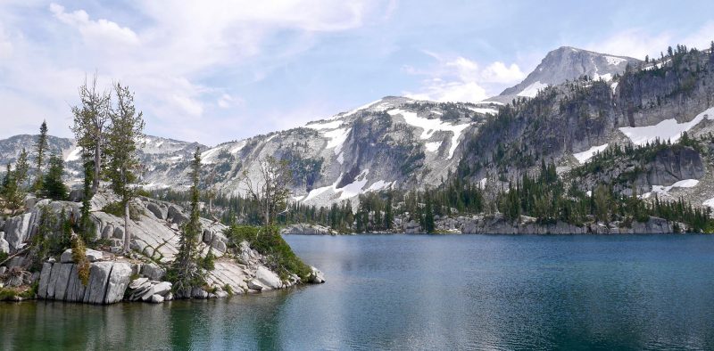 high alpine lake with mountain range
